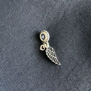 Pandora Angel wing charm with 14k gold heart accent